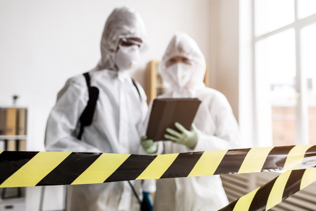 people-protective-suits-talking